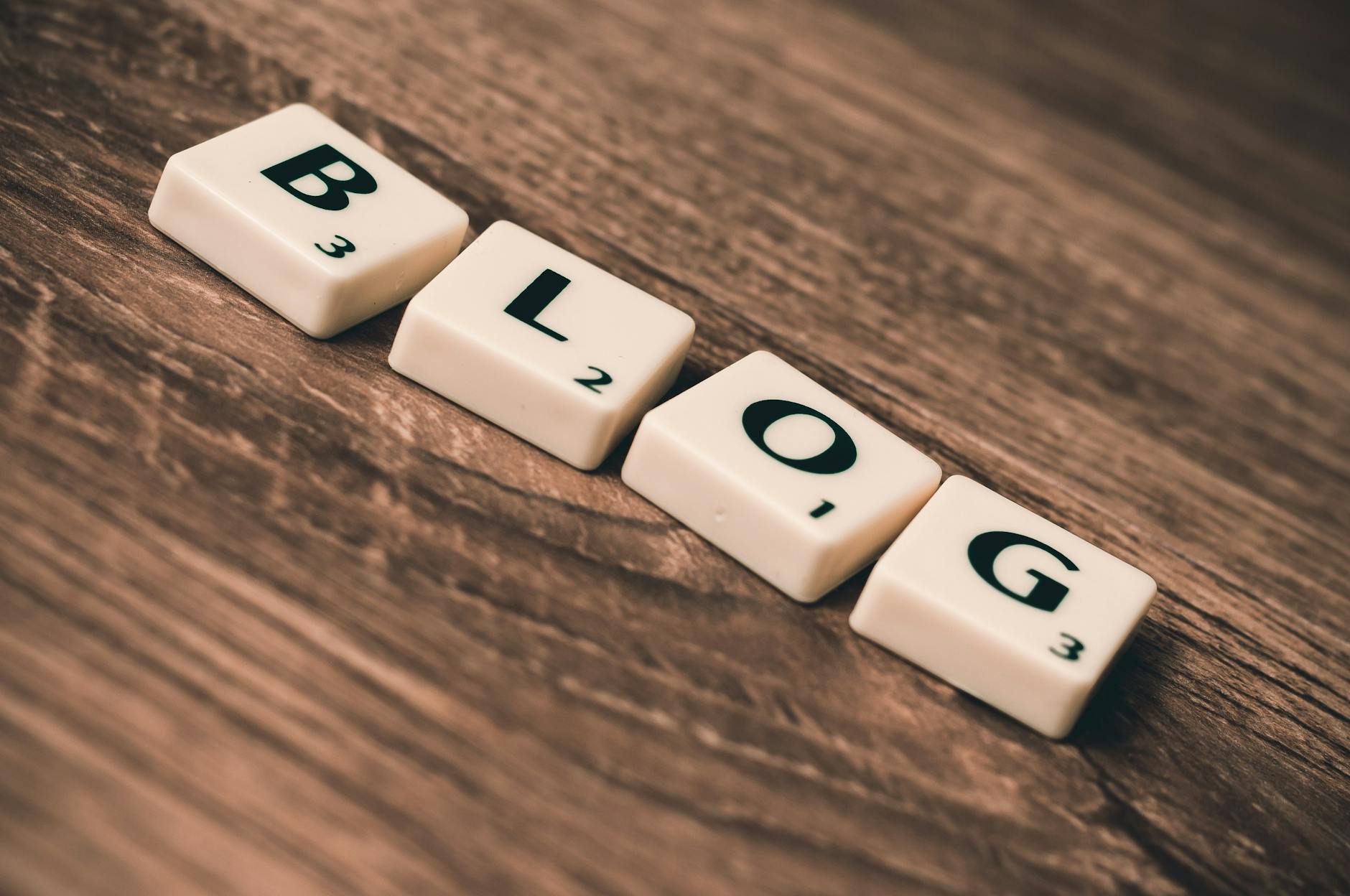 blog letters on brown wood. EJY Medical Writing, Dr Elizabeth Johnston-Young, Pencaitland, Scotland, UK